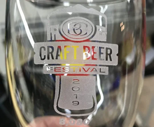 Festival glassware etched with the Craft Beer Festival crest
