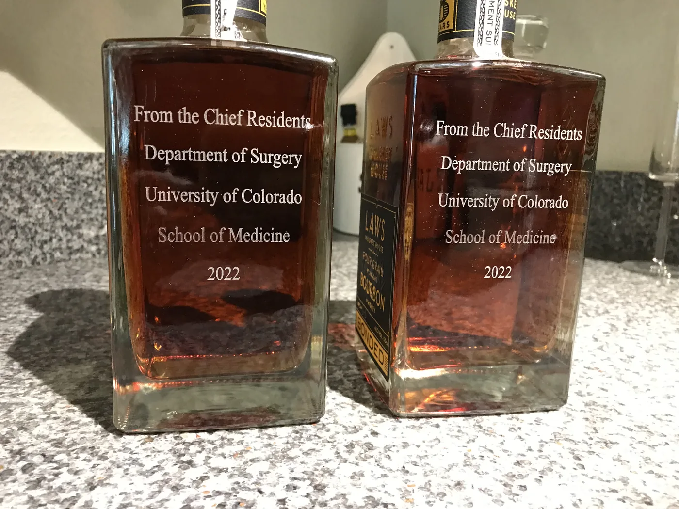 Engraved decanters from the Chief Residents, University of Colorado Department of Surgery