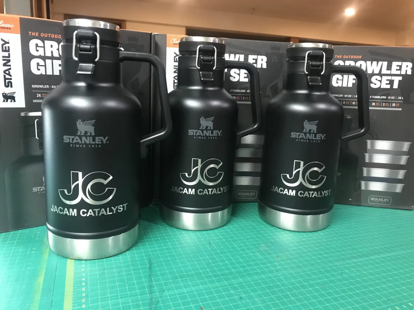 Stanley growlers laser branded with the JACAM CATALYST corporate logo