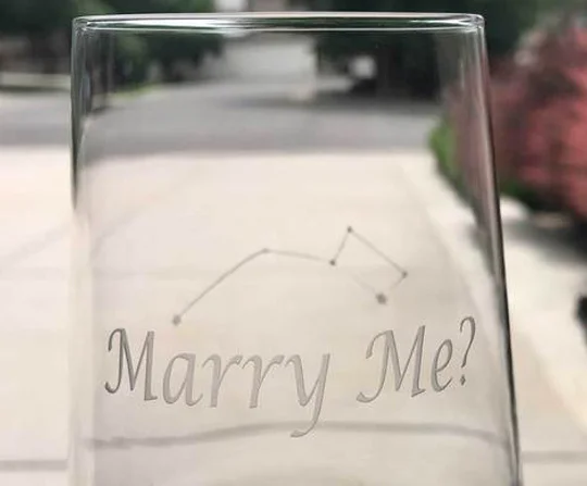 Glass vase etched with a Marry Me proposal and constellation design