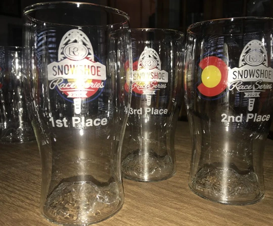 Snowshoe Race Series awards etched into pint glasses