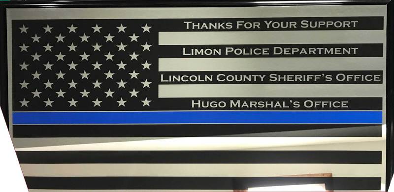 Thin blue line tribute flag honoring local police, sheriff and marshal offices
